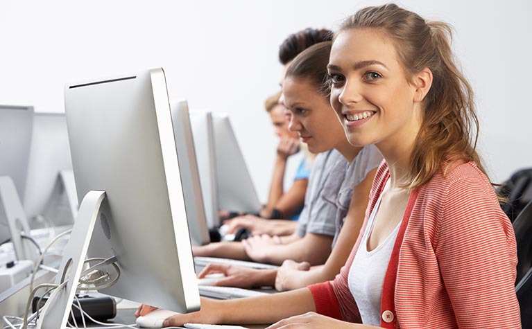 Group Of Students In Computer Class